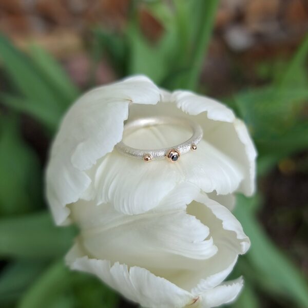 Silver, gold, black diamond