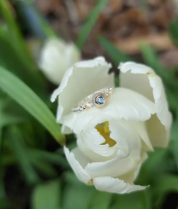Silver, gold, sapphire