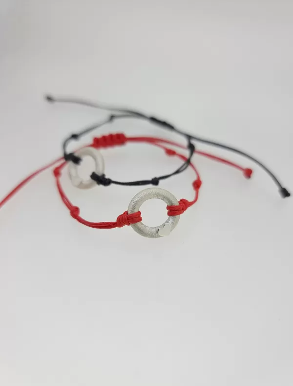 Silver, waxed string