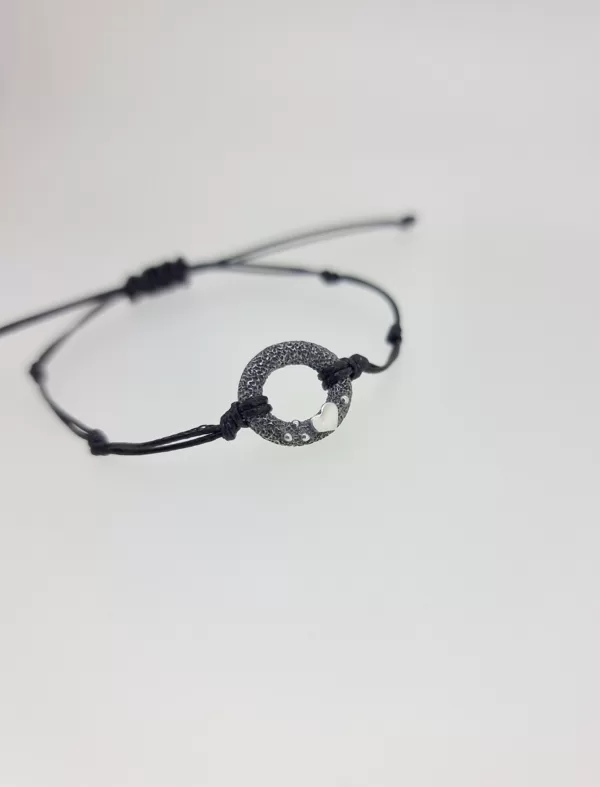 Silver, waxed string
