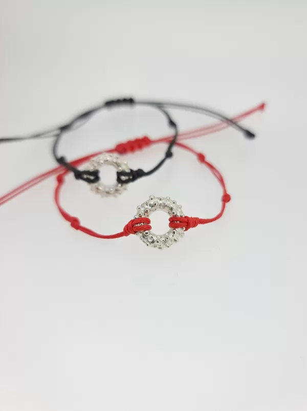 Silver, waxed string