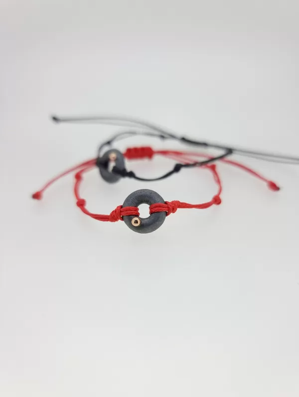 Silver, gold, waxed string