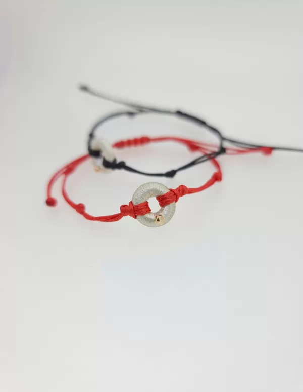 Silver, gold, waxed string