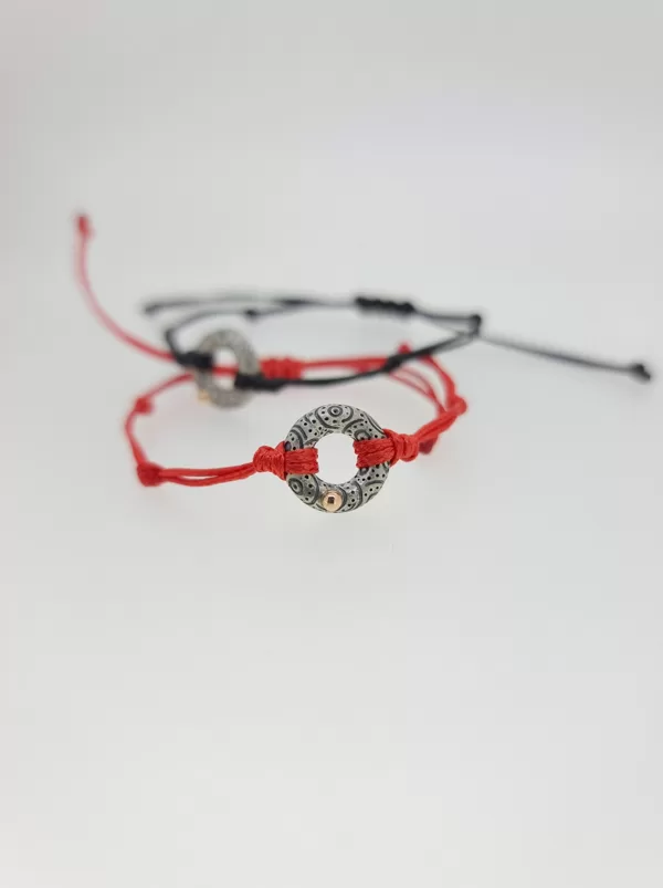 Silver, gold, waxed string