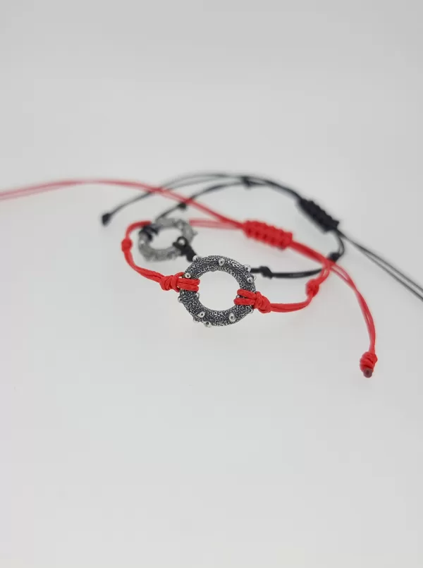 Silver, waxed string