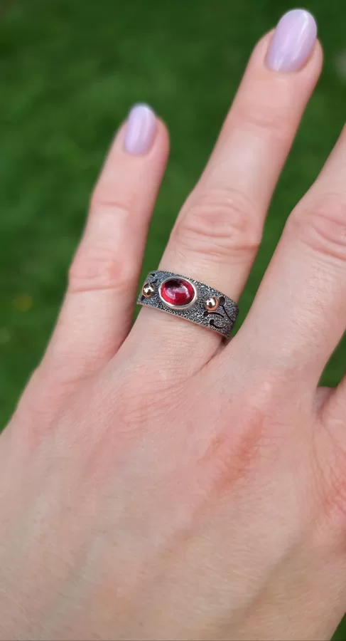 Silver, gold, garnet