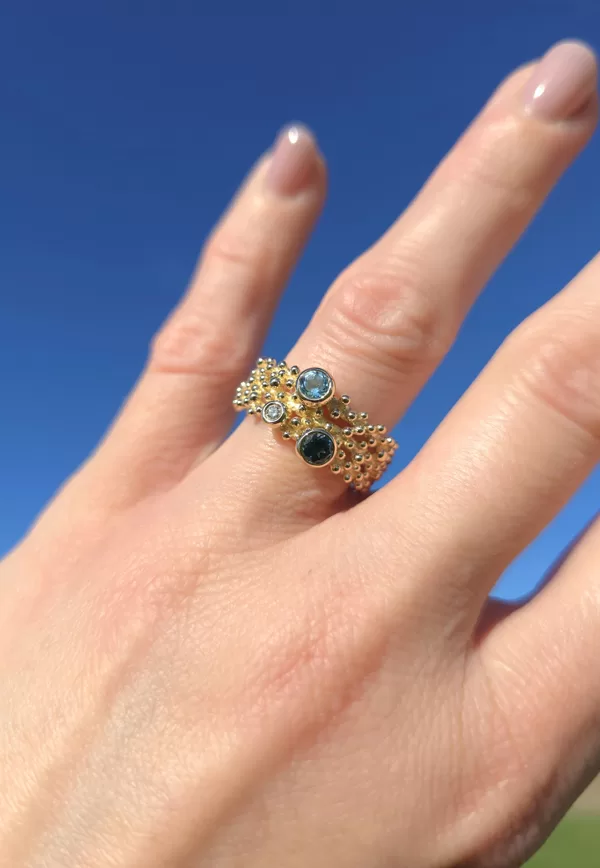 Yellow gold, topaz stones, diamond