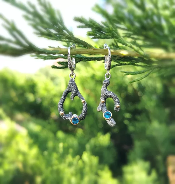 Silver, gold, topaz stones
