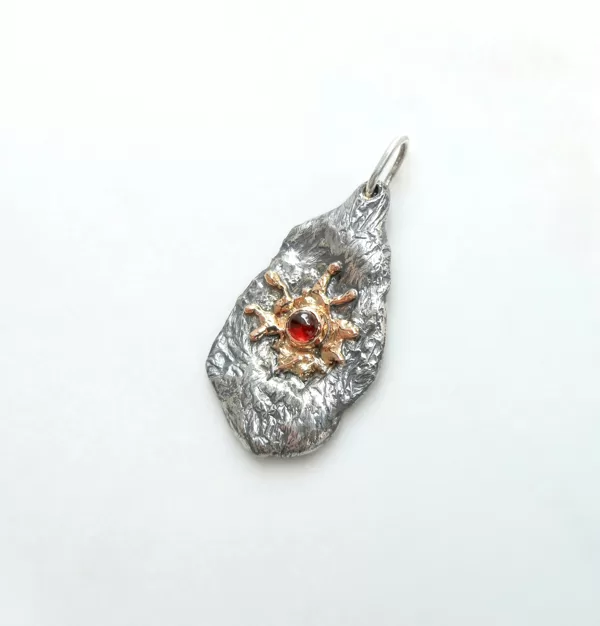 Silver, gold, garnet