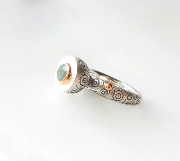 Silver, gold, topaz