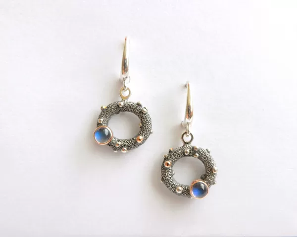 Silver, gold, moonstones