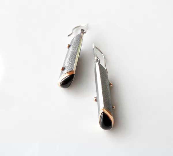 Silver, gold, onyx stones